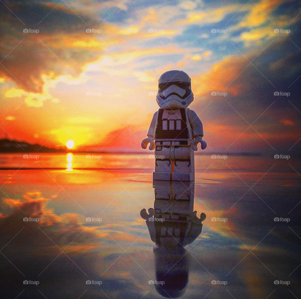 Lego man starring down the sunset