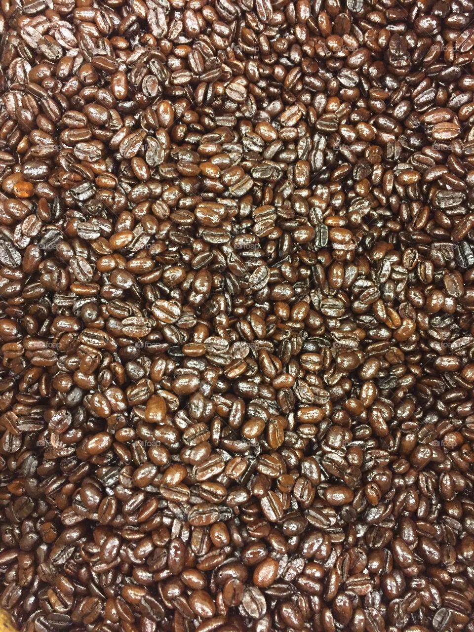 Overhead view of dark coffee beans