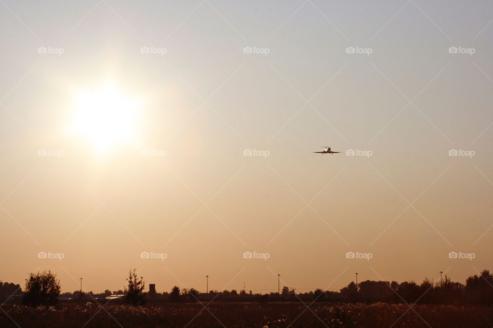 Sunset and airplane 