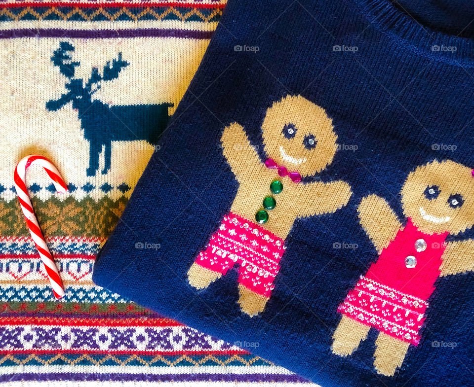 Christmas jumpers with a candy cane