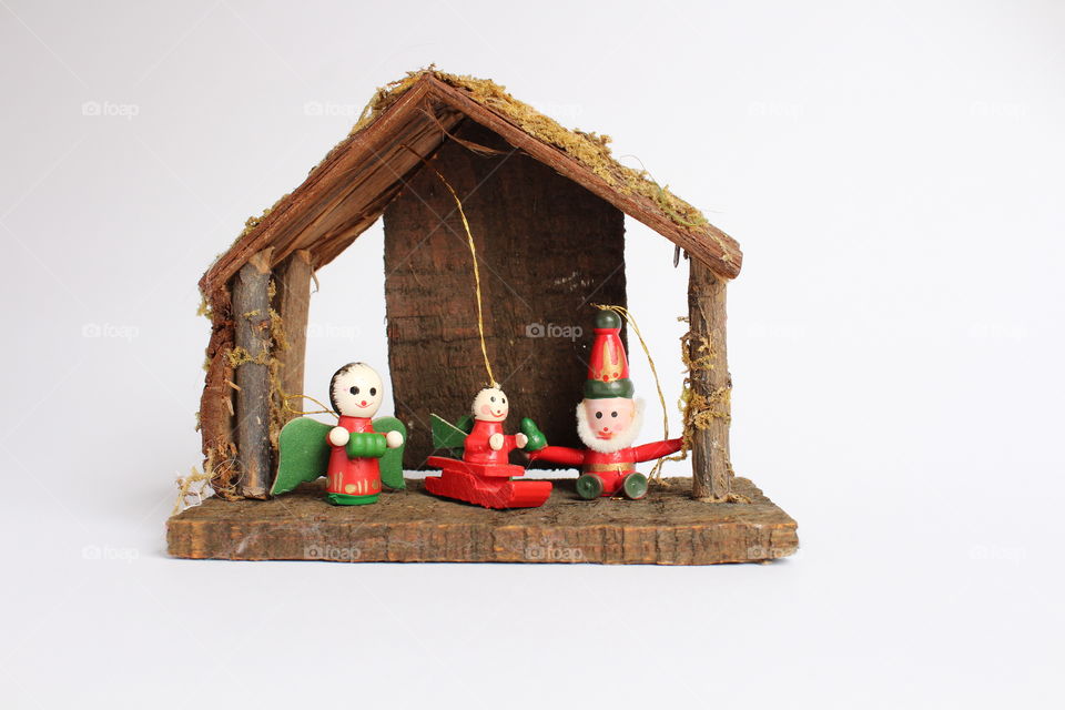 miniature wood House and Christmas figurines