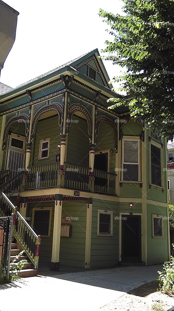 Colorful house. Walking to the neighborhood