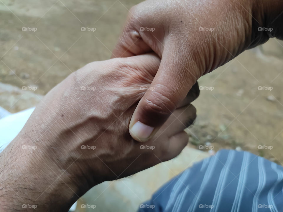 Man and woman holding hands