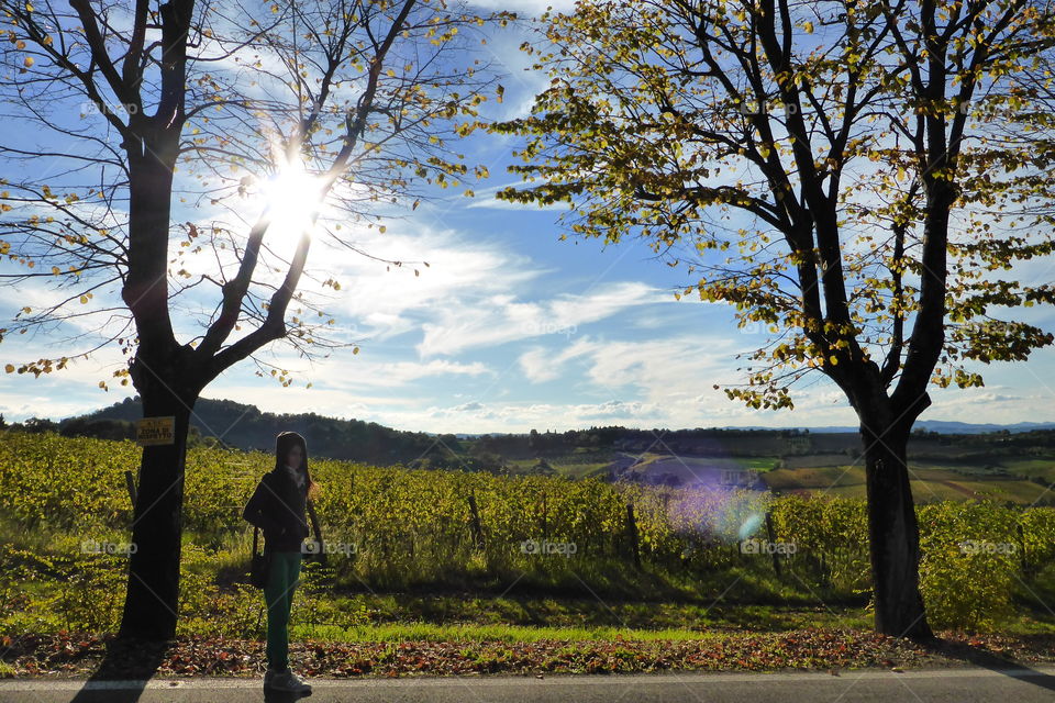 Teenage girl standing on roadside