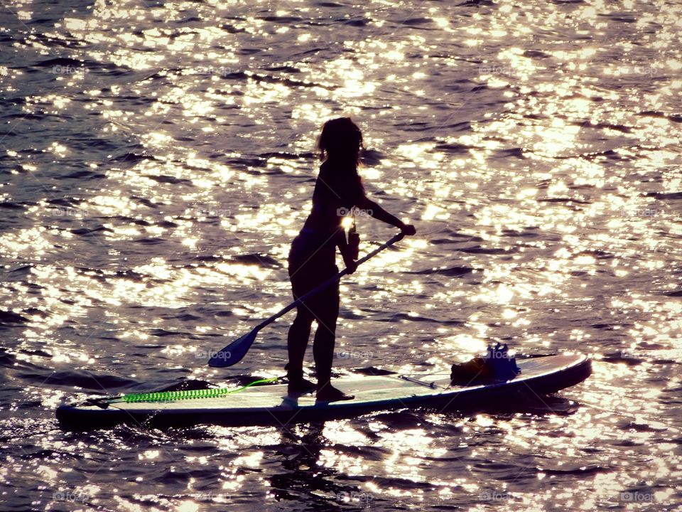 Girl on a paddle board