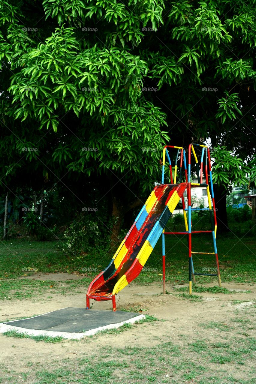 colorful steel slide in an outdoor park or playground