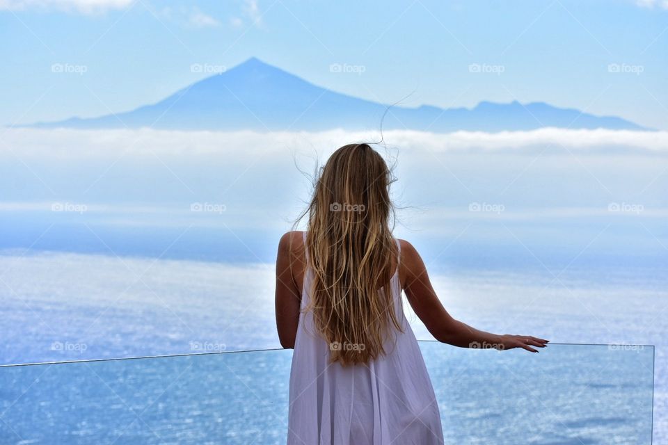 woman on abrante view point on la gomera canary island in Spain with tenerife canary island view