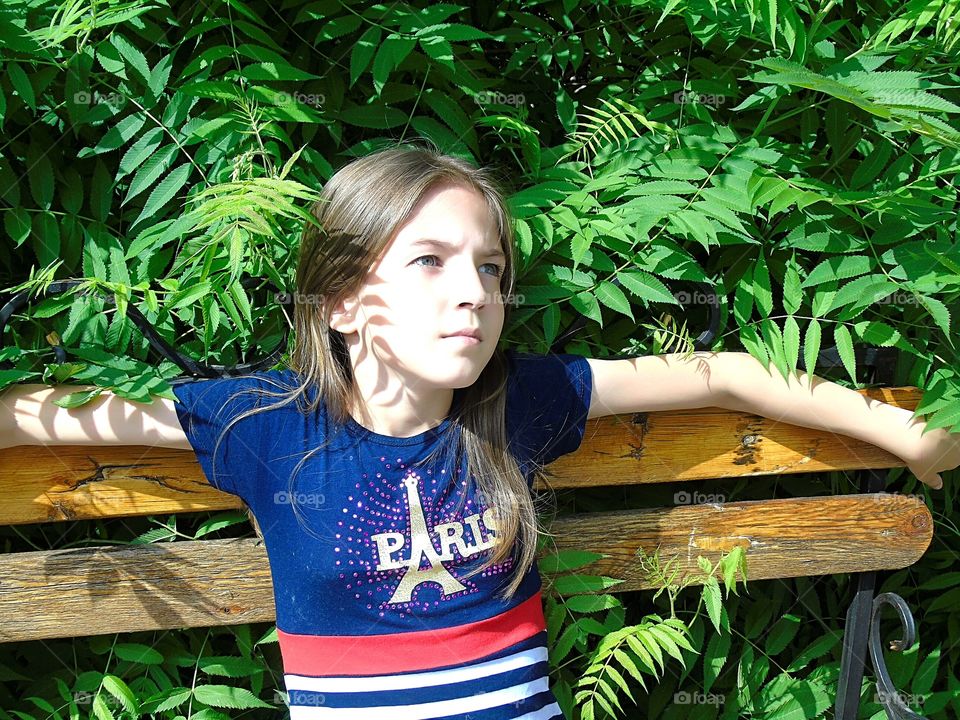 the shadow of a fad on the girl's face