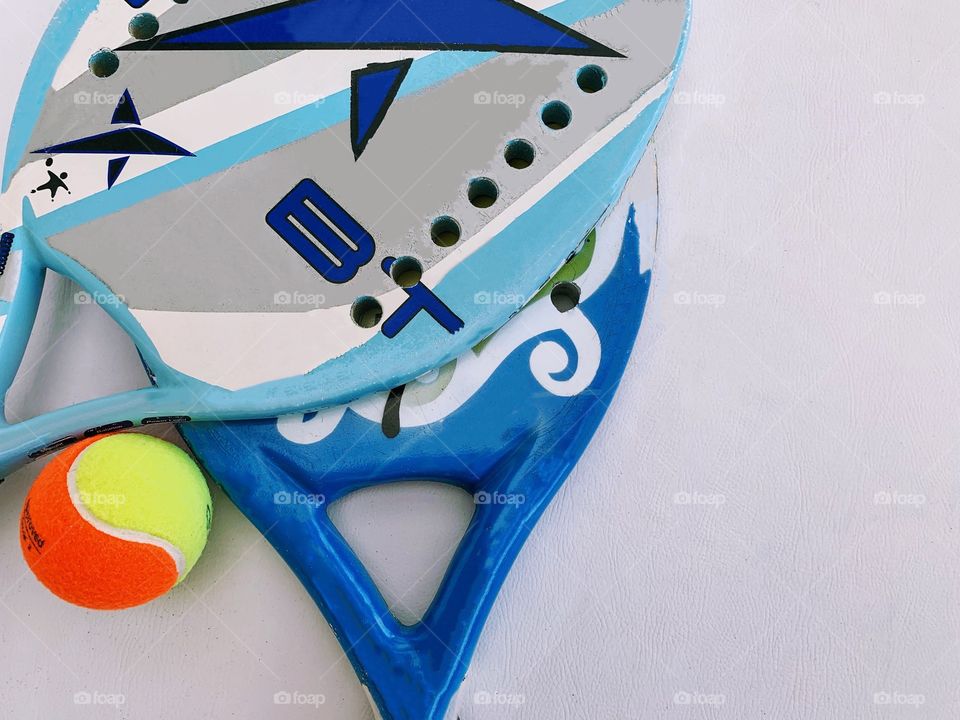 Beach tennis ball and racket