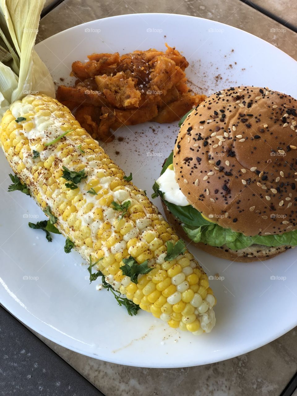 June backyard Barbecue (corn,burgers,and sweet potatoes)