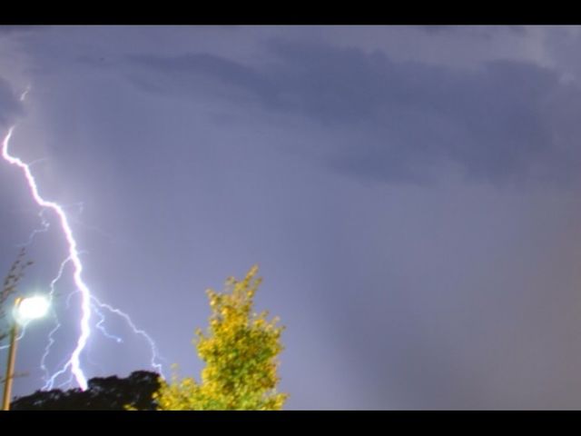 Striking lightning.