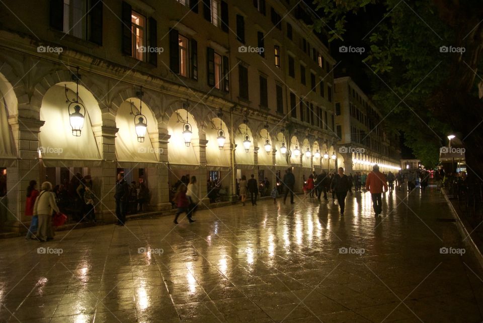 Along the Liston after the rain at night, Corfu Town, Greece