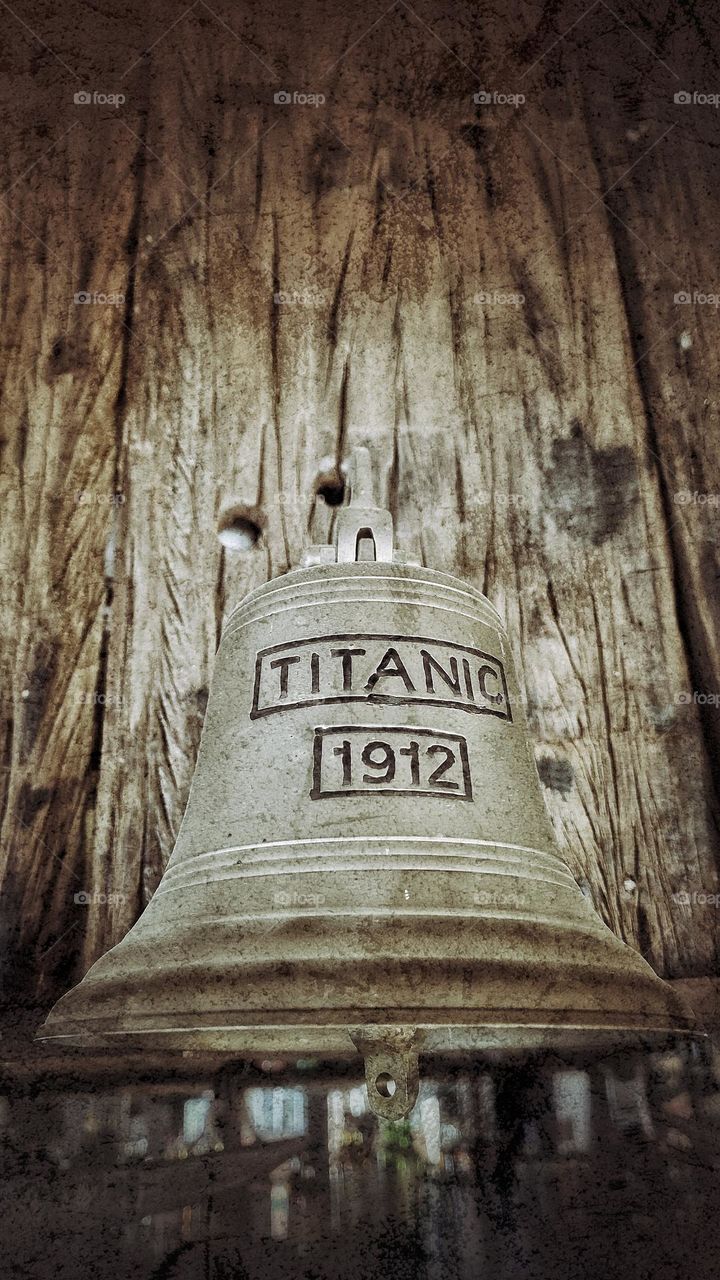 metal bell and wood