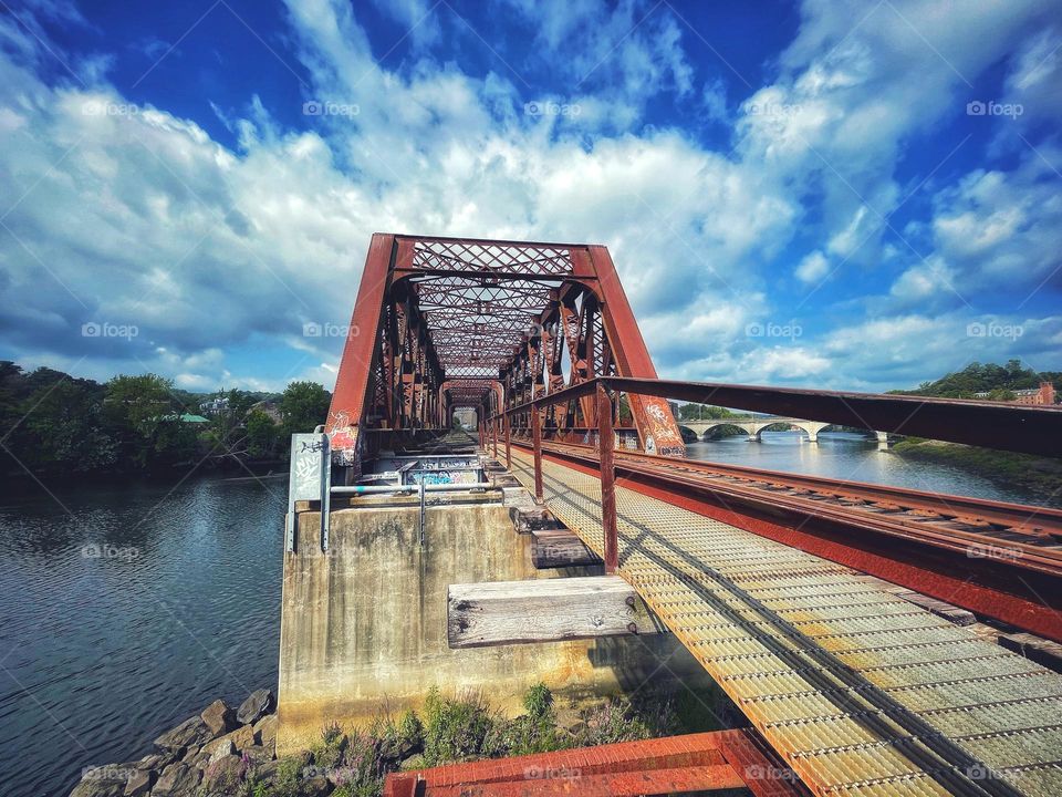 Walking across an old abandoned bridge 