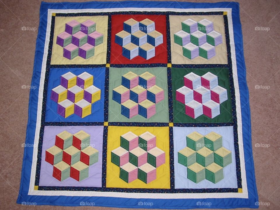 Hand sewn baby quilt. 