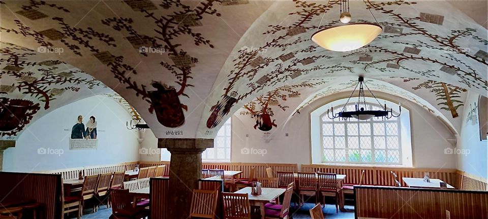 This is the restaurant of the beer garden at the “Königliches Weißes Brauhaus”, the “Royal White Brewhouse” in “Kelheim”, Bavaria with its vaulted exquisitely painted ceilings and polished wood. It was founded in 1607. 2024. Hypnotic Productions