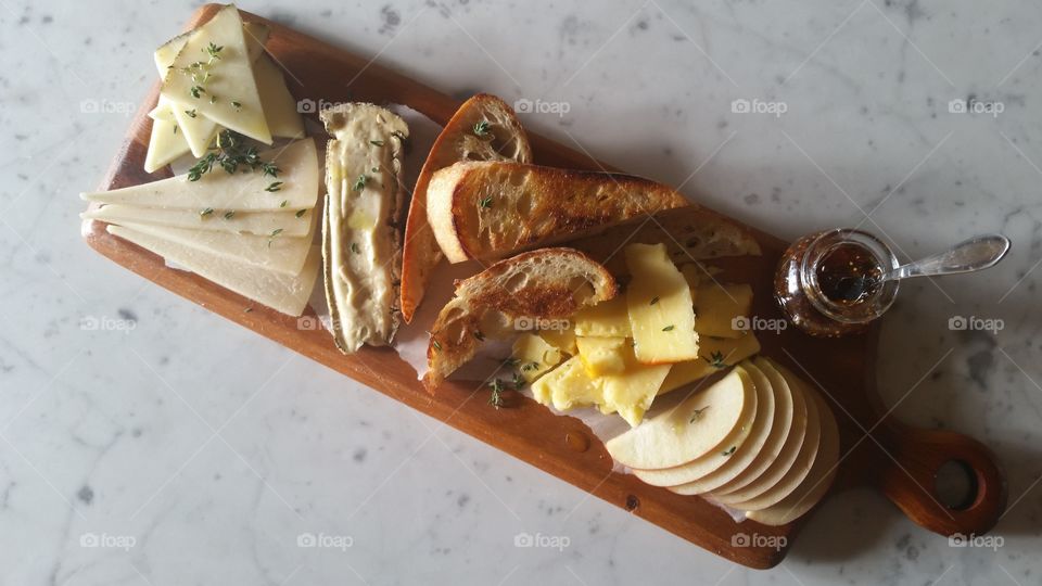 cheese charcuterie board with fig Jam