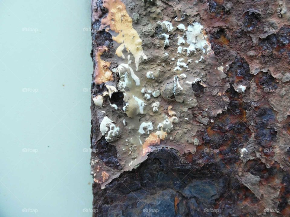 rusty metal wall with paint.