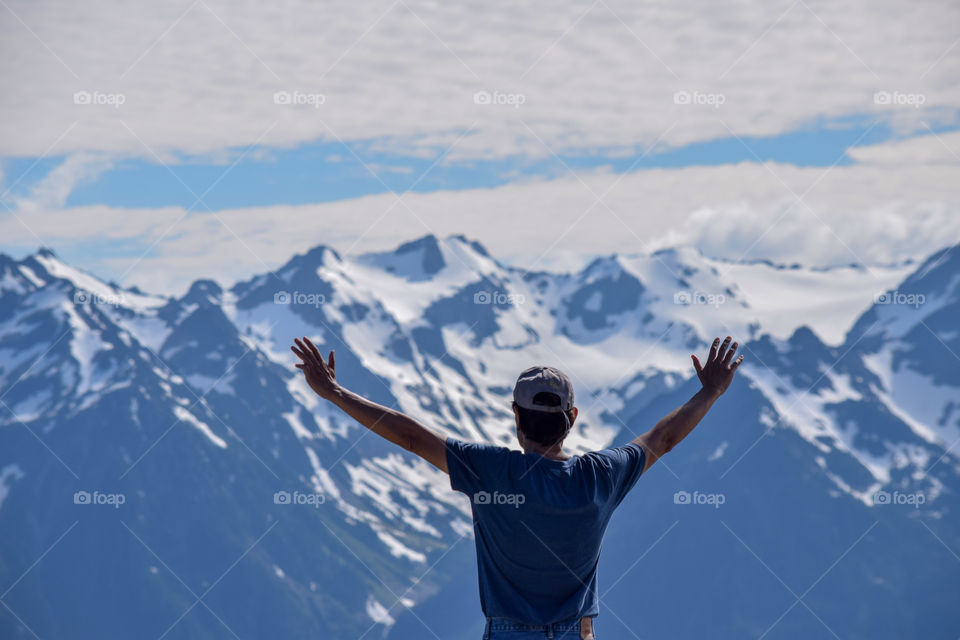 Man amazed by the beauty of mountains 