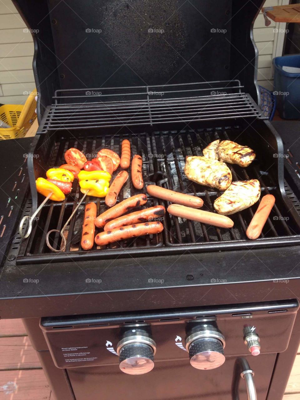 Grill food . Grill out on Memorial Day