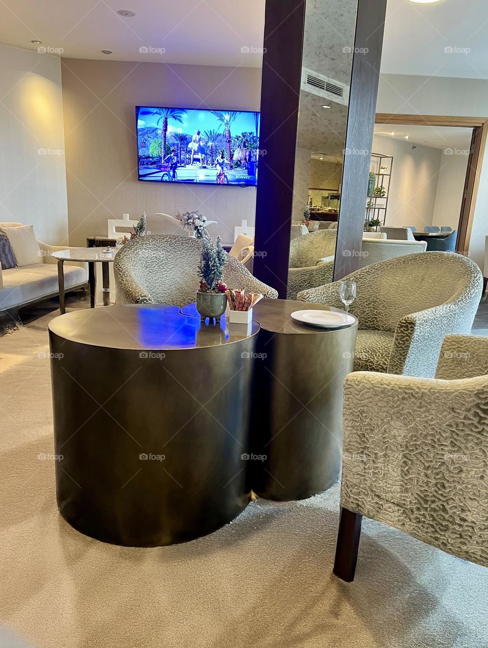Wooden table of unusual shape in the living room