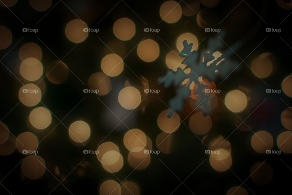 Defocused snowflake and bokeh