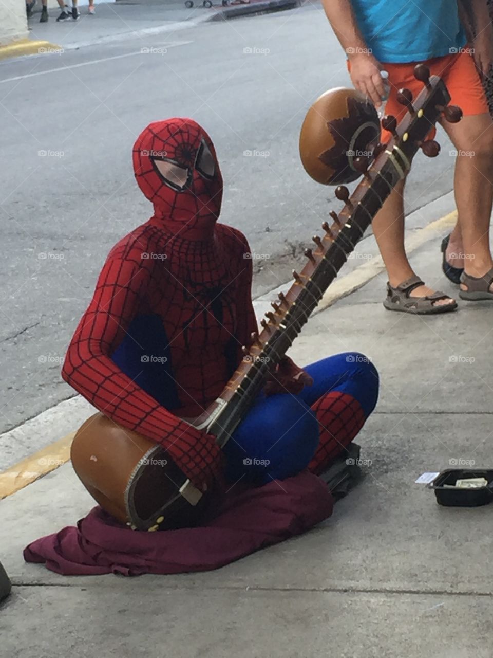 Spider man playing a lite, Key West, FL, USA