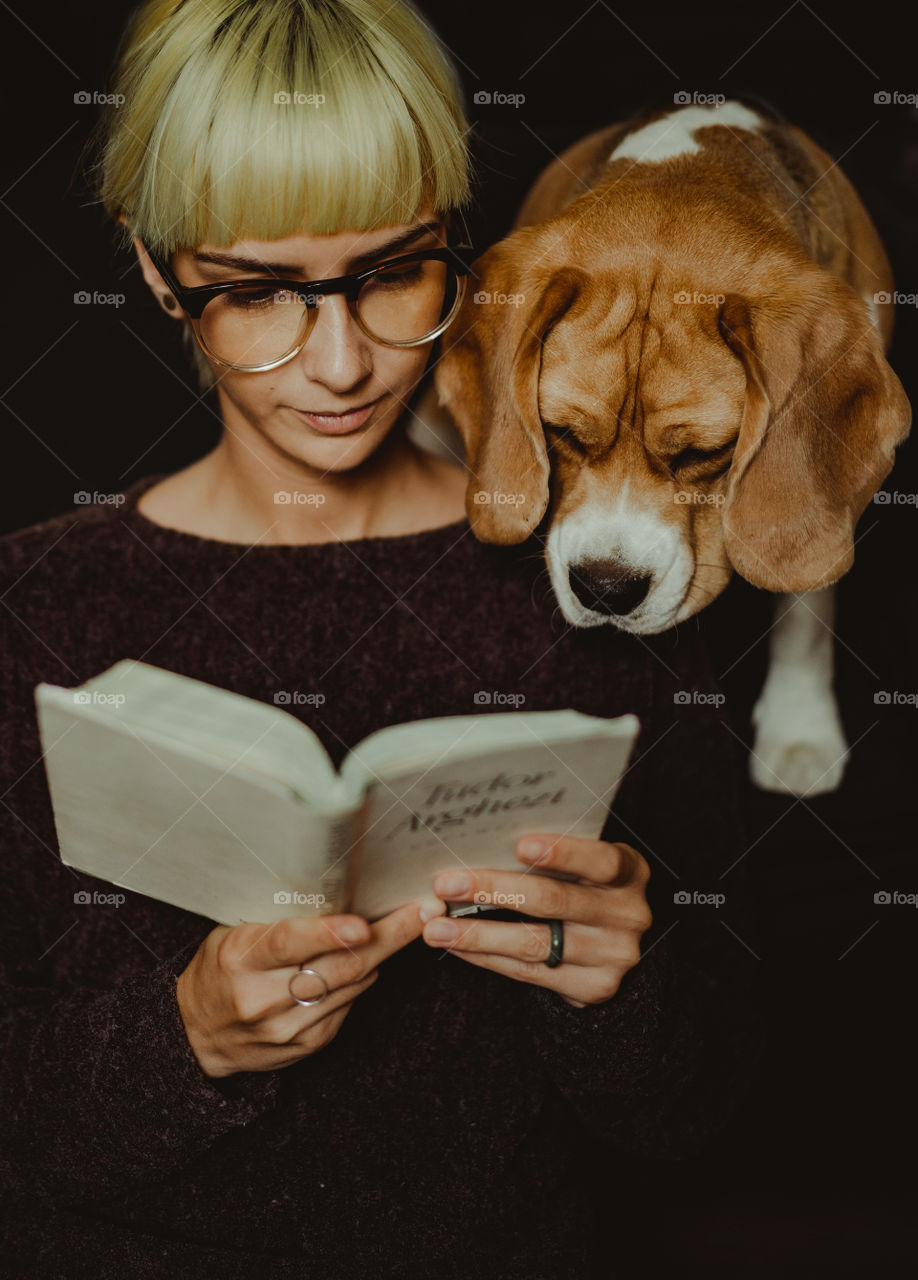 Reading time with my beagle dog
