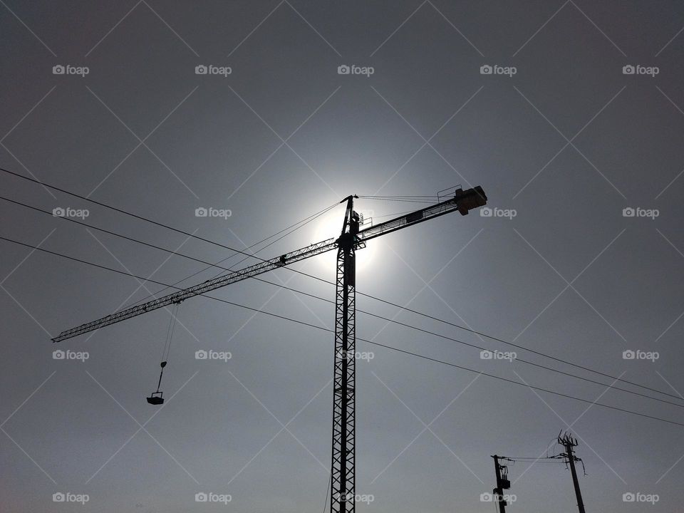 Crane and electric lines