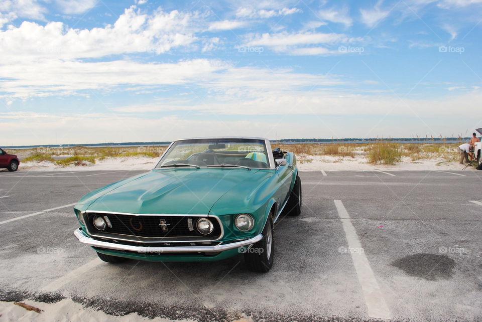A beautiful Ford Mustang at the beach at Gulf Island, Fl