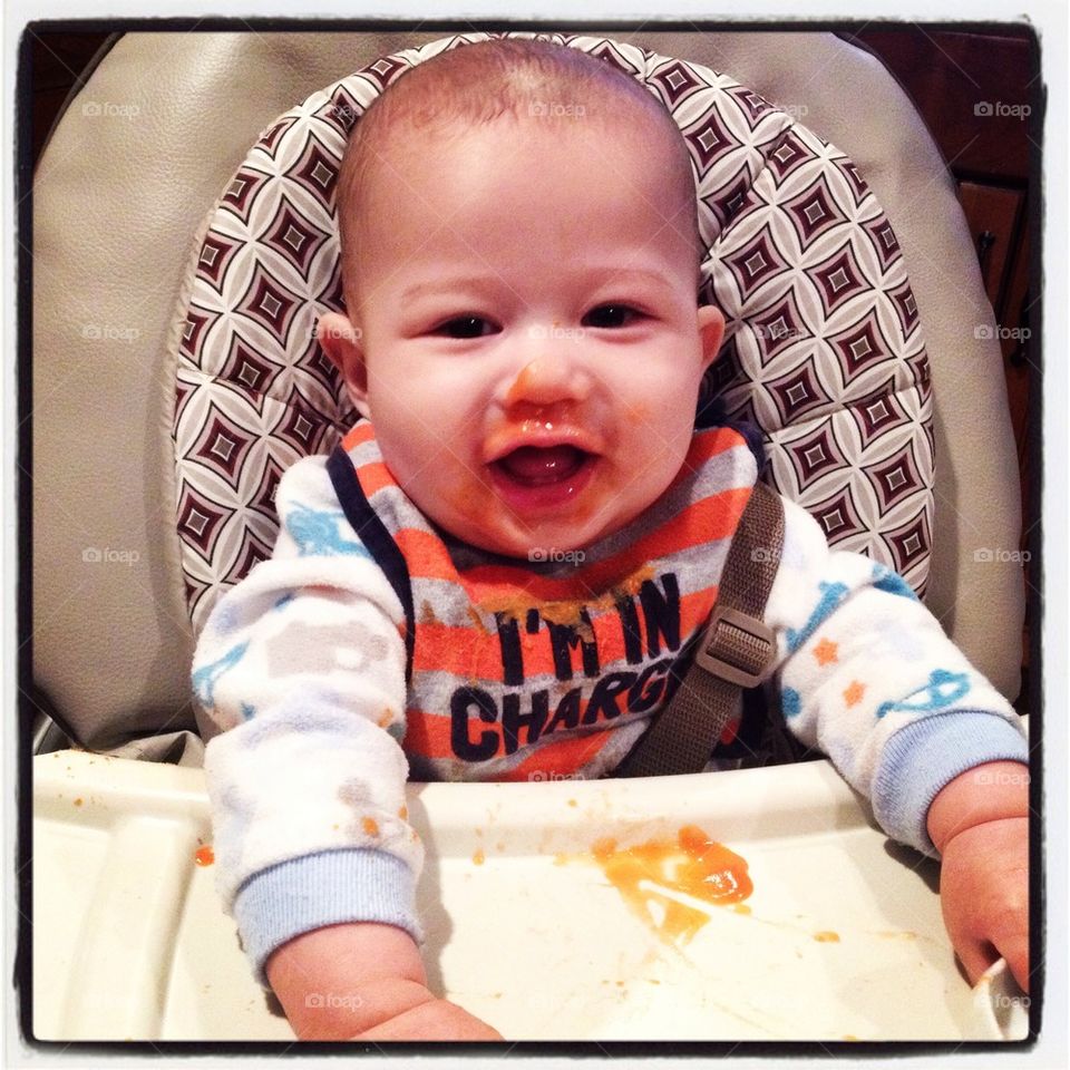 Baby eating carrots