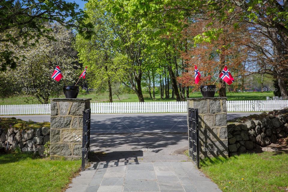 Birthday in Norway .
gate and flag ,norwegian . 
street photography by the church