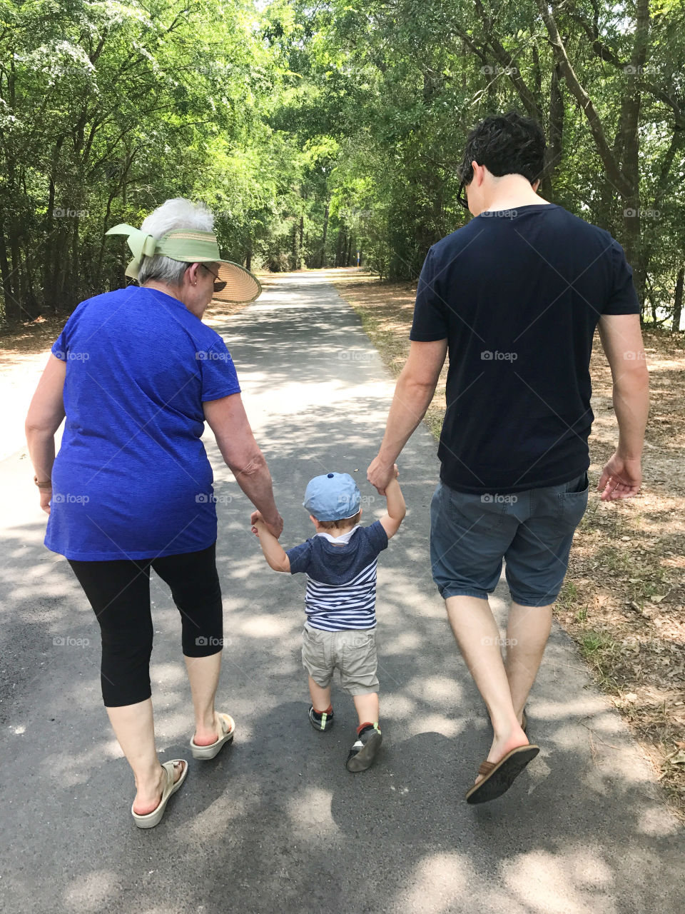 Taking a walk with grandma and dad