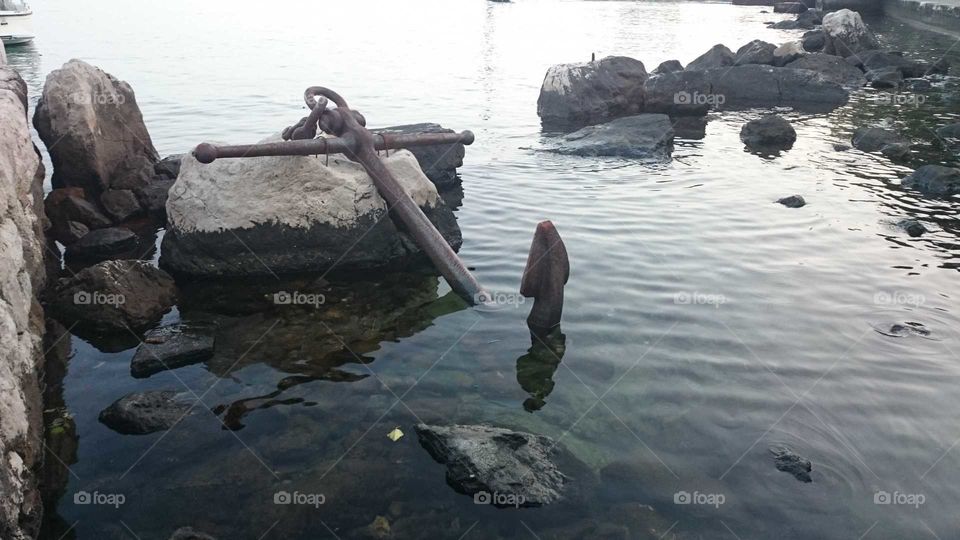 Anchor at waterfront in Adriatic Sea