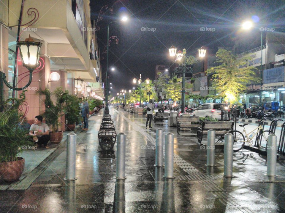Jogja street at night after rain