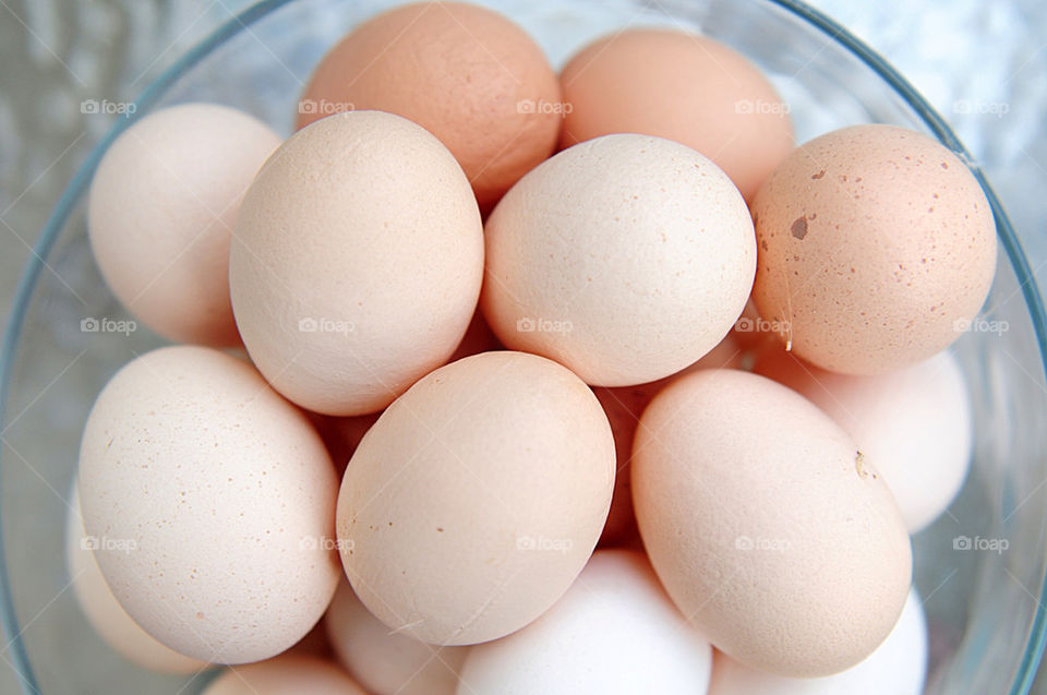LOTS OF EGGS IN A GLASS BOWL