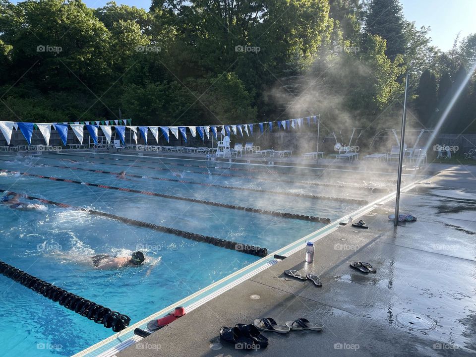 Early morning swim practice in cold temps of spring.