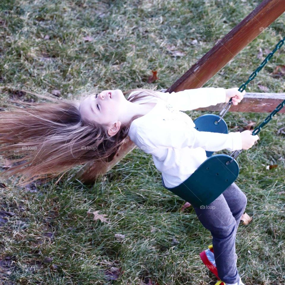carefree on a swing