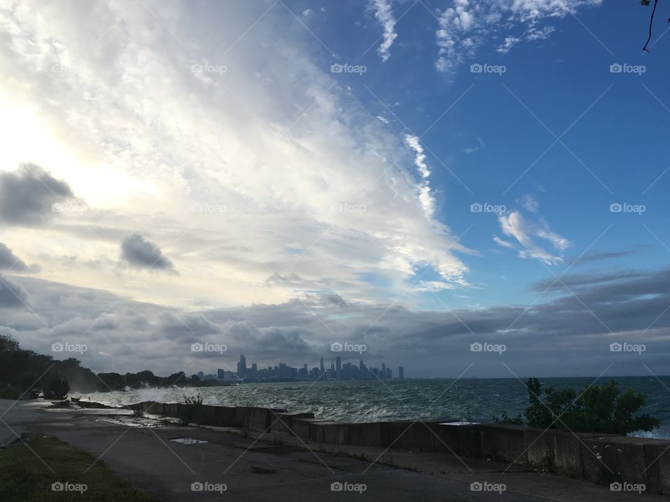 Chicago skyline and Lake Michigan as storm clouds gather. 