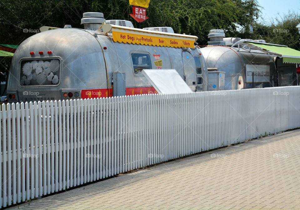 Street Food is ready to eat food or drink sold by a vendor or hawker, in street or other public place, such as a market or fair. I often buy Street Food from a portable food booth, food cart or a food truck! Yummy, yum!