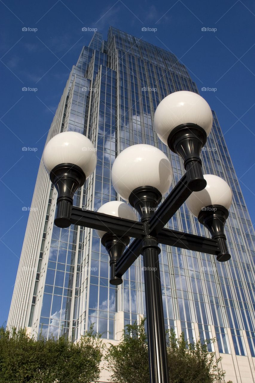 Tall building with lamp post