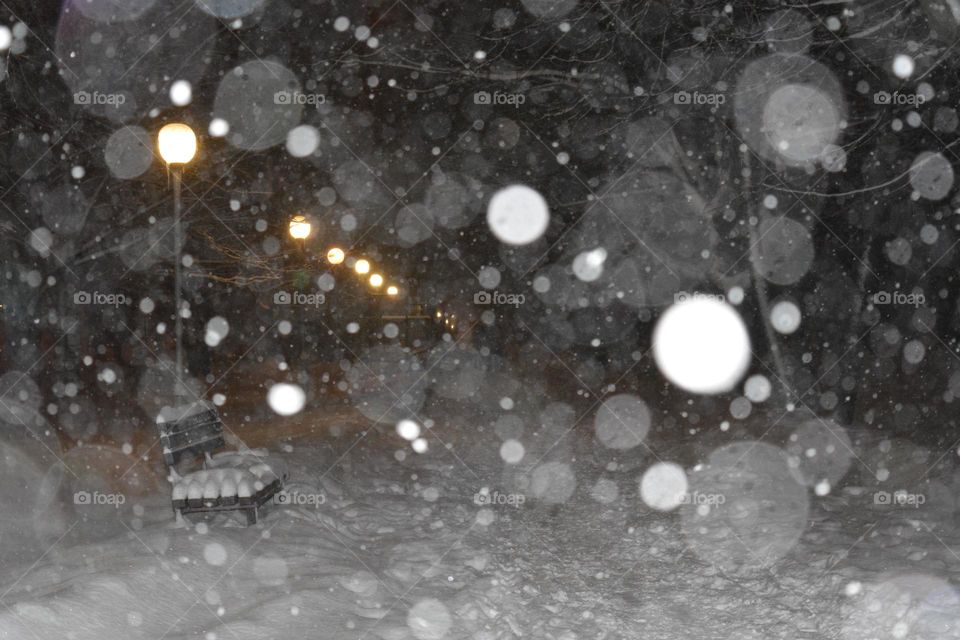 winter snowfall night street