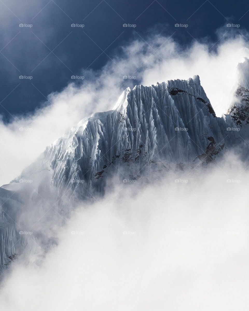 Mountain covered with cloud wall