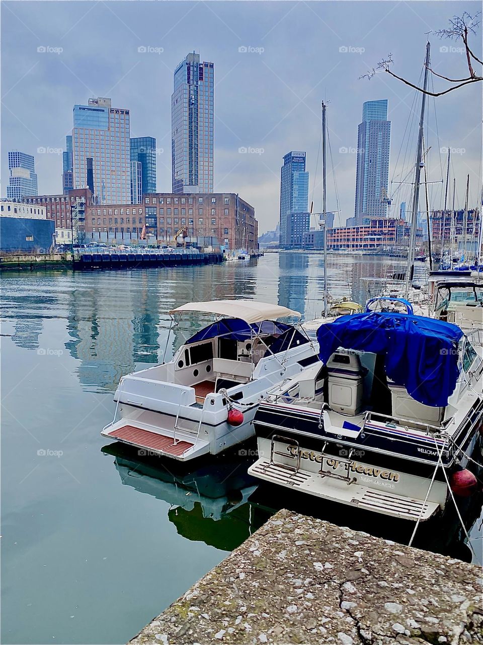 “Newtown Creek” in LIC, Queens, NY is one of the most central locations in the city. You see “Greenpoint”, Bklyn on the left, LIC on the right and far away the “Manhattan” skyline with the “Empire State Bldg” can be seen. 2023. Hypnotic Productions