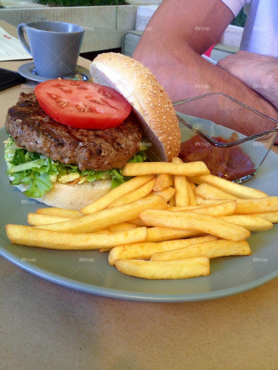 Burger with french fries on a plate