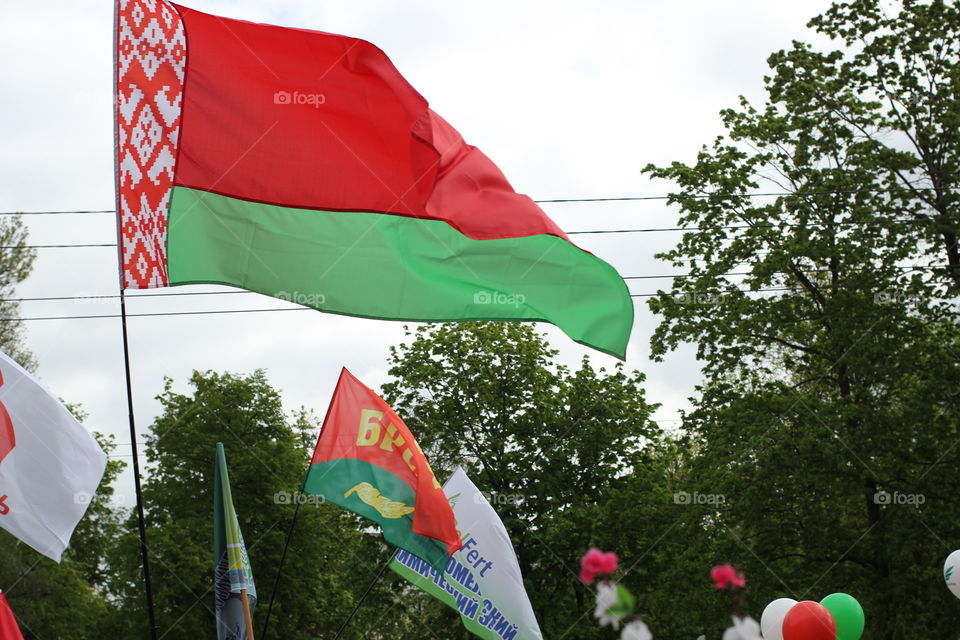 Flag of Belarus, flag of the Republic of Belarus. A parade dedicated to the Victory Day. May 9, 2017. Belarus, Gomel. Reportage photo.