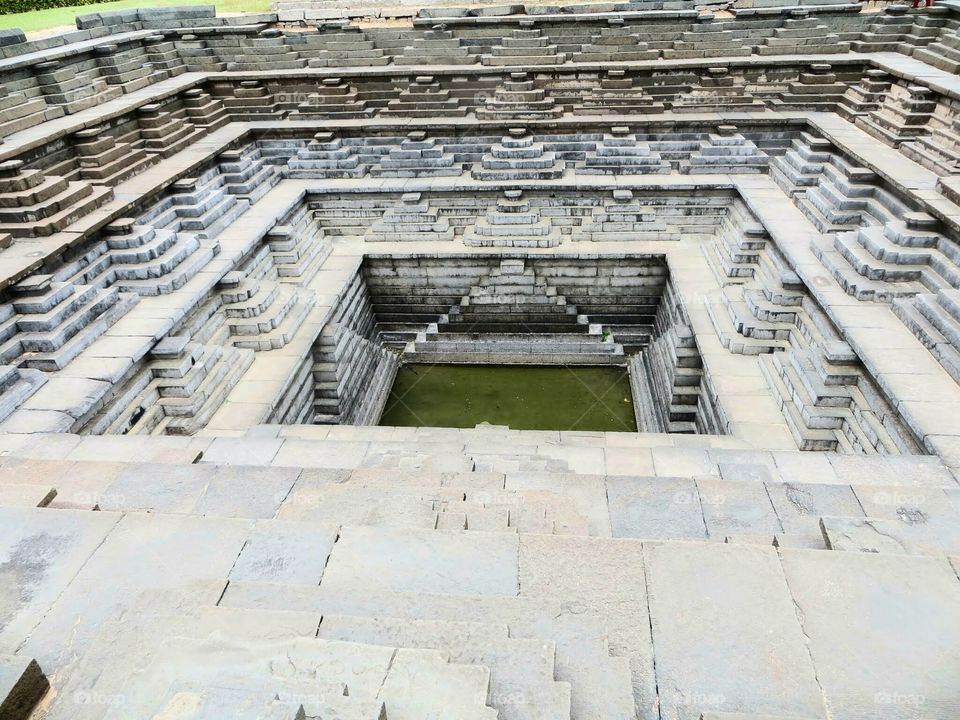 Ancient pond recently unearthed at Hampi