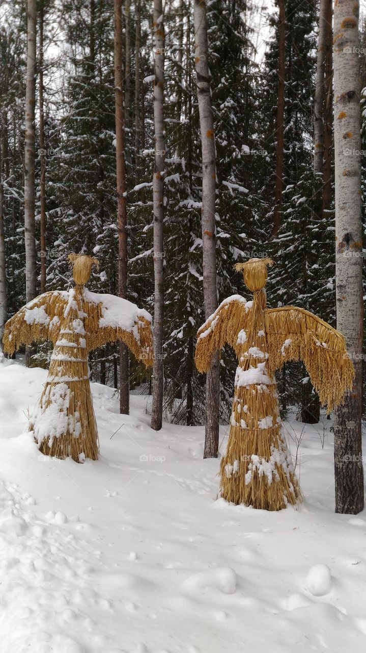 Museum of forest architecture."Malye Karelys"Arkhangelsk.Russia.straw figures.