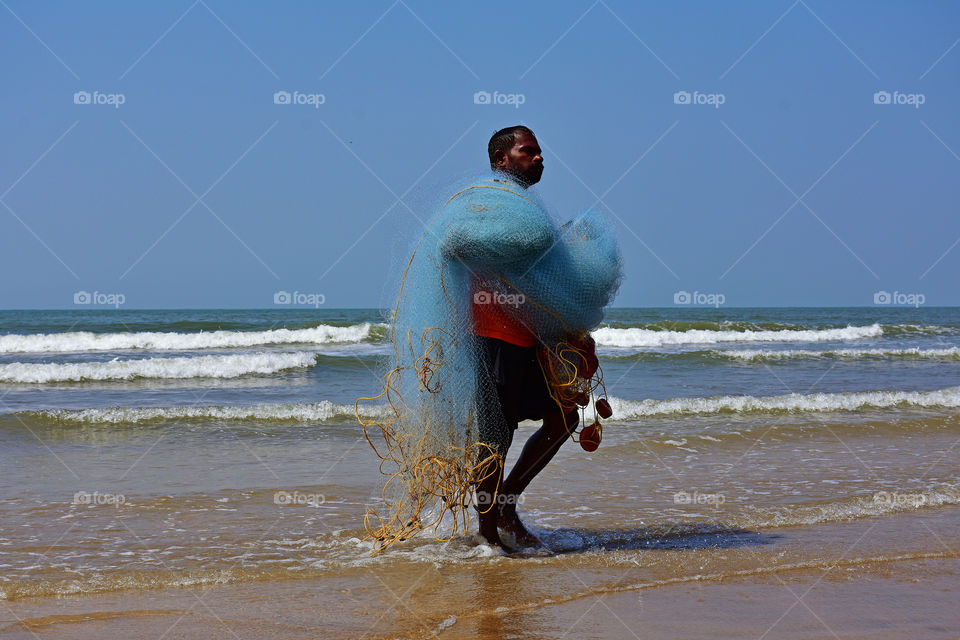 fisherman with his fishing net