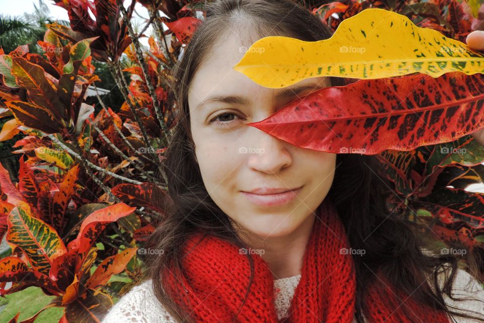 Vivid and natural red from garden leaves and scarf knitting.